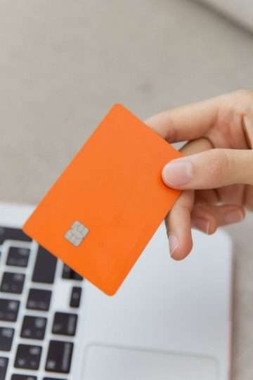 Customer using a credit card to place an online cannabis order for delivery. 